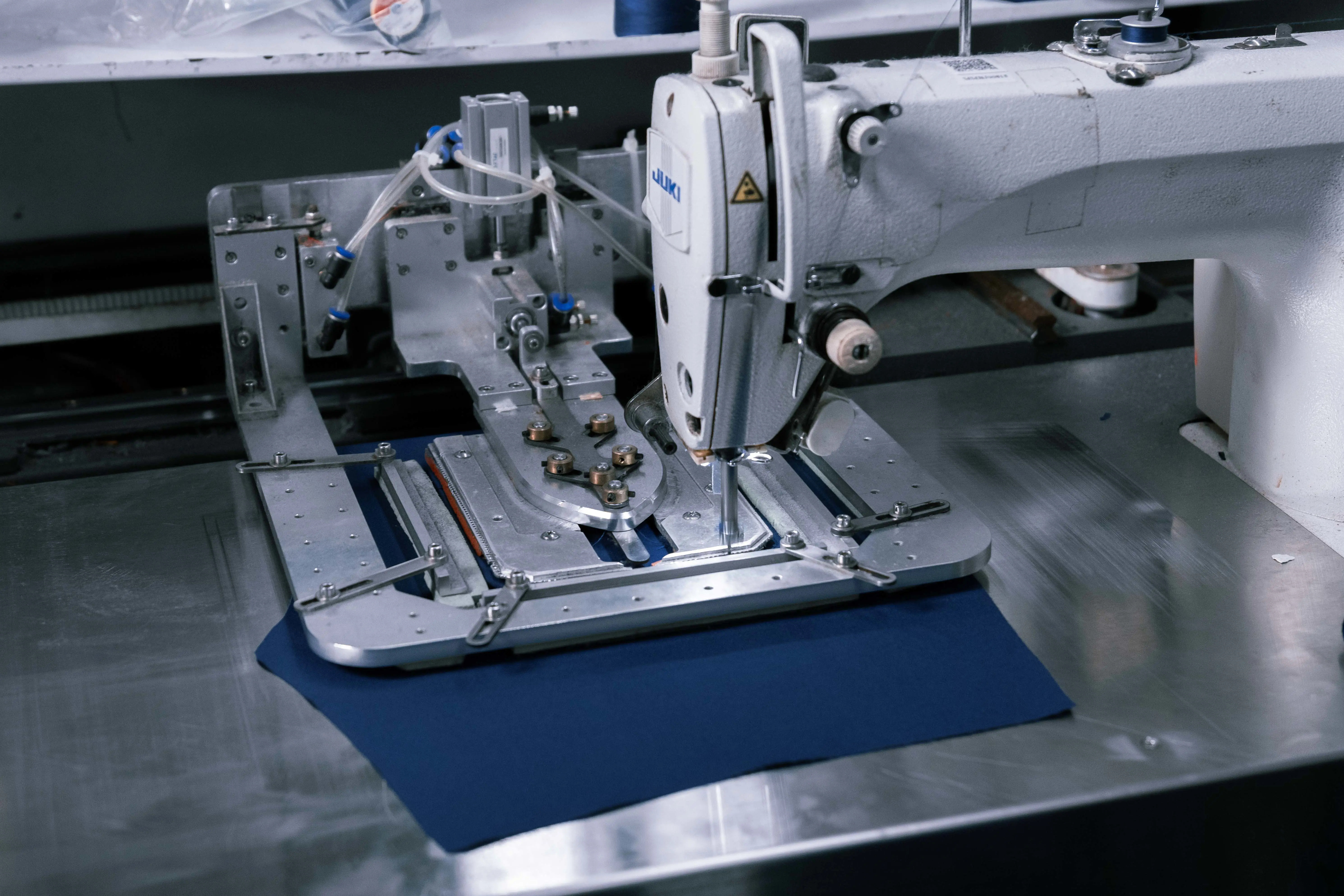 MÁY GẤP VÀ MAY TÚI TỰ ĐỘNG - Hình 6 MÁY GẤP VÀ MAY TÚI TỰ ĐỘNG - Hình 6